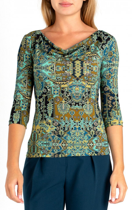 Elegant top with draped neckline with graphic and floral print in blue-green color
