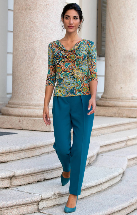 Atractive top with draped neckline in combination with paisley and floral pattern