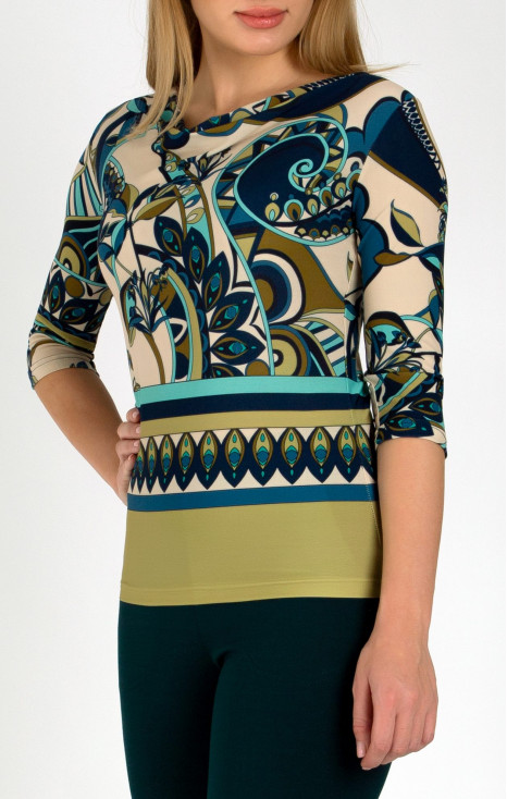 Attractive top with draped neckline in combination with abstract and floral print in blue-green colo