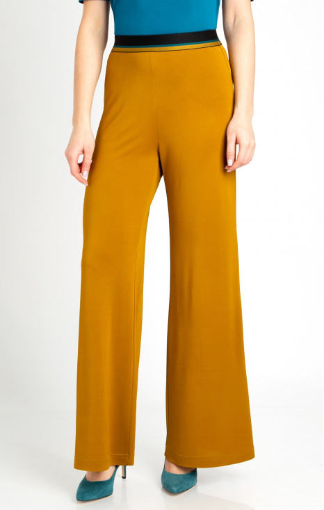 Loose fit trousers in Mustard Gold color