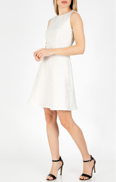 A luxurious jacquard dress in Vanilla Ice colour