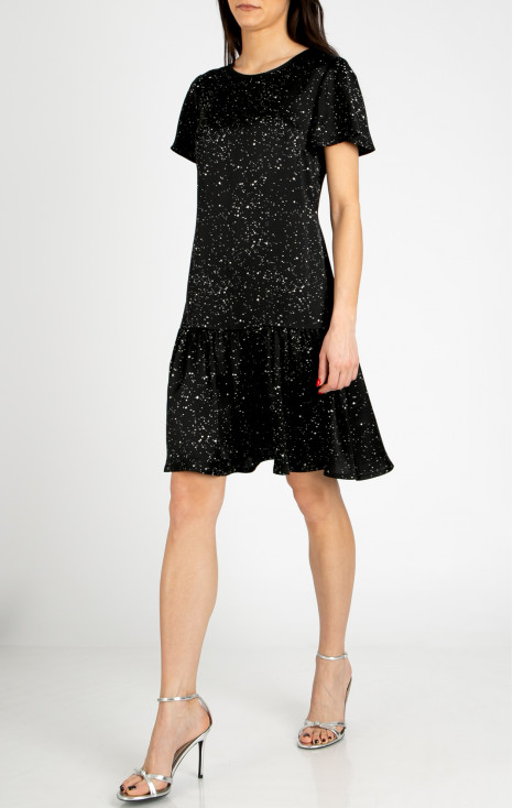 Elegant dress with a ruffle, made of satin-finish viscose in black with a fine graphic print