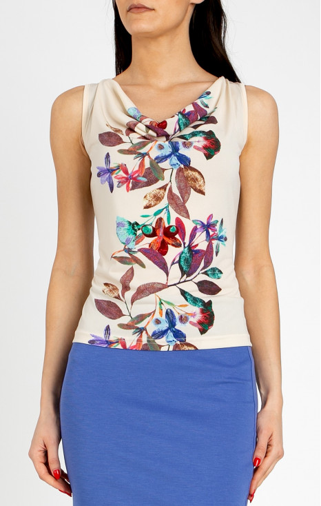 Stylish blouse with a draped neckline in Vanilla Ice, featuring a vertical floral border