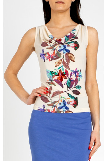 Stylish blouse with a draped neckline in Vanilla Ice, featuring a vertical floral border