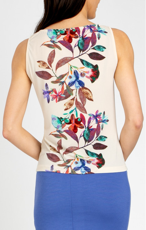 Stylish blouse with a draped neckline in Vanilla Ice, featuring a vertical floral border [1]