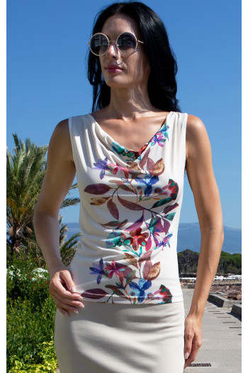 Stylish blouse with a draped neckline in Vanilla Ice, featuring a vertical floral border