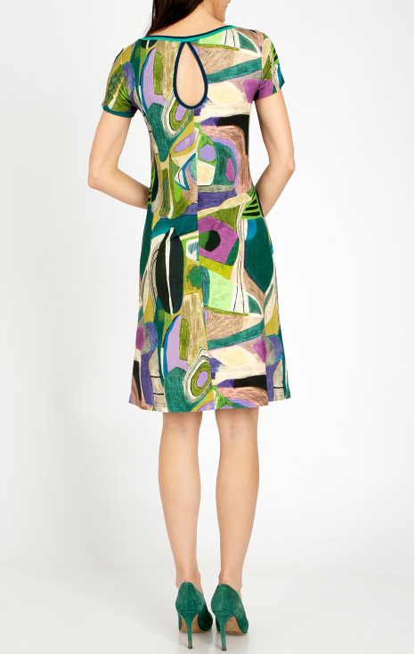 Comfortable knit dress in a dynamic graphic print in Avocado Green and Lilac. [1]