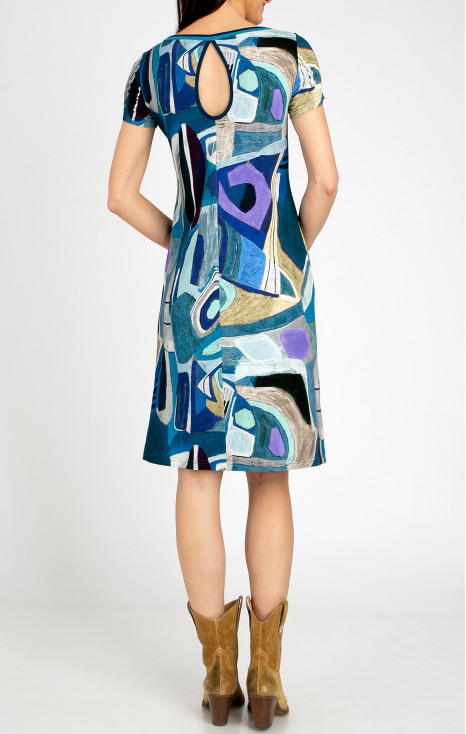 Comfortable knit dress with a dynamic print in shades of Navy Blue and Violet Tulip