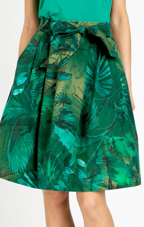 Flared cotton skirt with a tropical print in shades of green