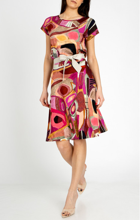 Short flared skirt made of lightweight knit fabric in a graphic print in Brick and Fuchsia