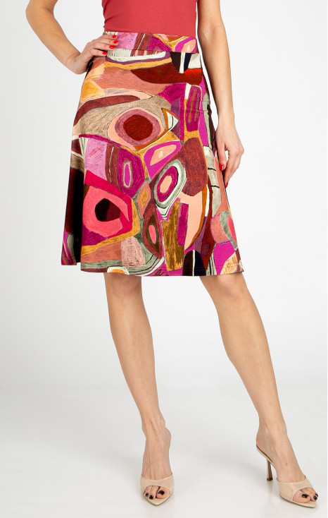 Short flared skirt made of lightweight knit fabric in a graphic print in Brick and Fuchsia