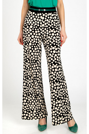 Trousers made of knit jersey fabric with a striking large polka dot print