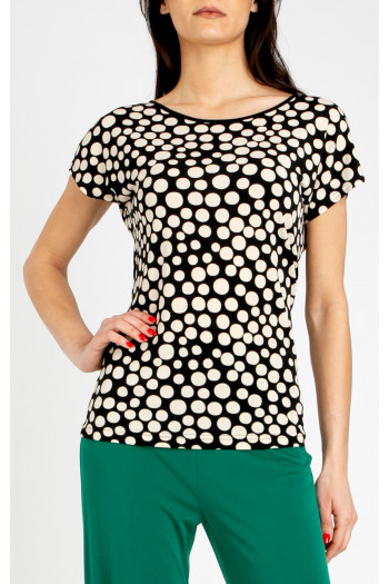 Elegant blouse with a striking large polka dot print
