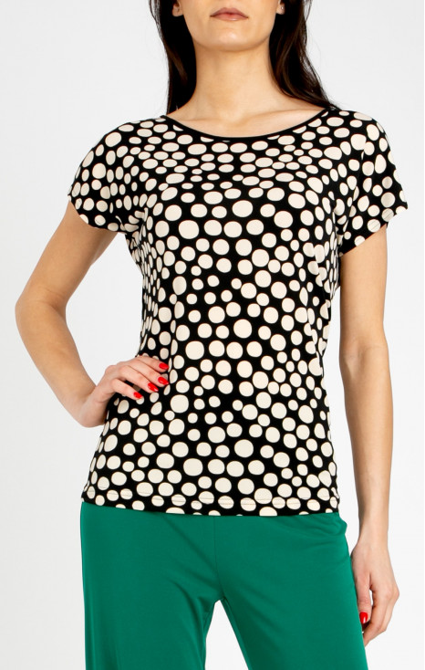 Elegant blouse with a striking large polka dot print