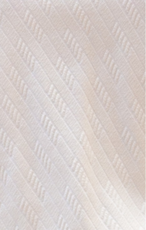 Blouse with a loose silhouette in cotton with a fine textured finish in Coconut Milk Color