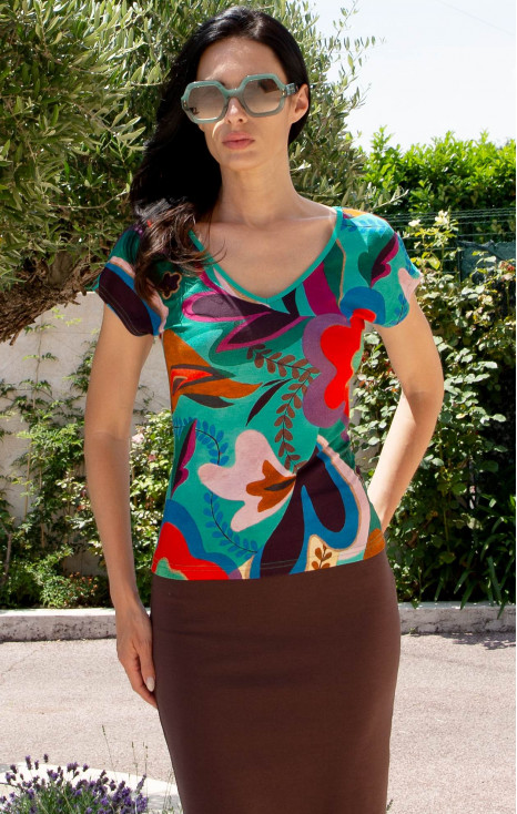 Summer blouse with a vibrant floral print in bright colors